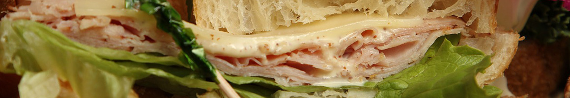 Eating Deli Sandwich at Hilary's Restaurant and Royal Deli restaurant in Royal Palm Beach, FL.